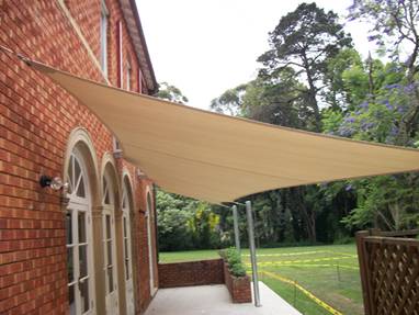 Attaching shade sail to sales house